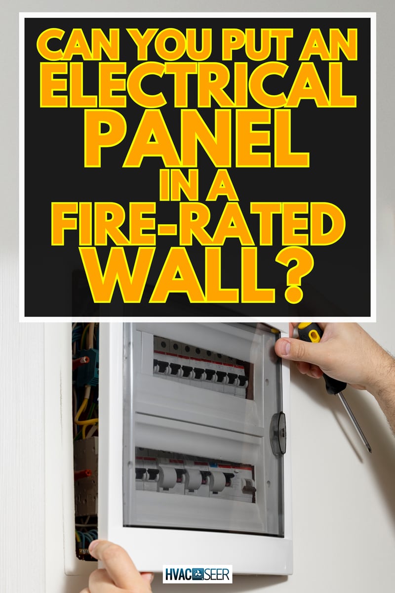 A close up of an electrical engineer working in a power electrical panel in apartment building, Can You Put An Electrical Panel In A Fire-Rated Wall?