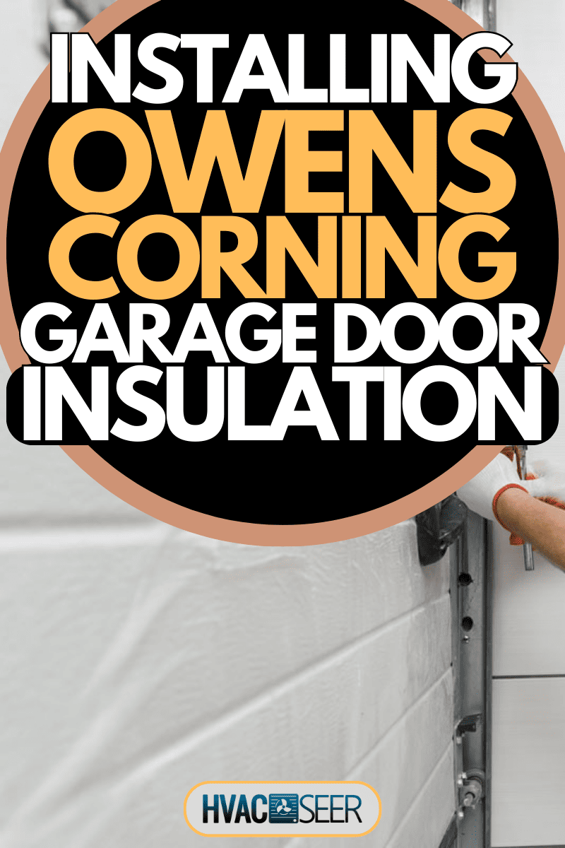 The worker is installing the lifting gates of the garage, How To Install Owens Corning Garage Door Insulation Kit