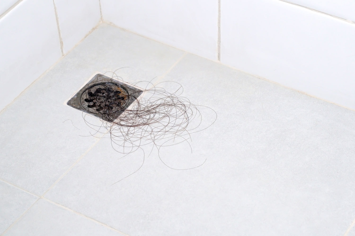 A clogged drain due to hair