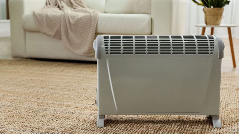 A modern portable heater at the living room, How To Reset A Heat Storm Heater - 1600x900