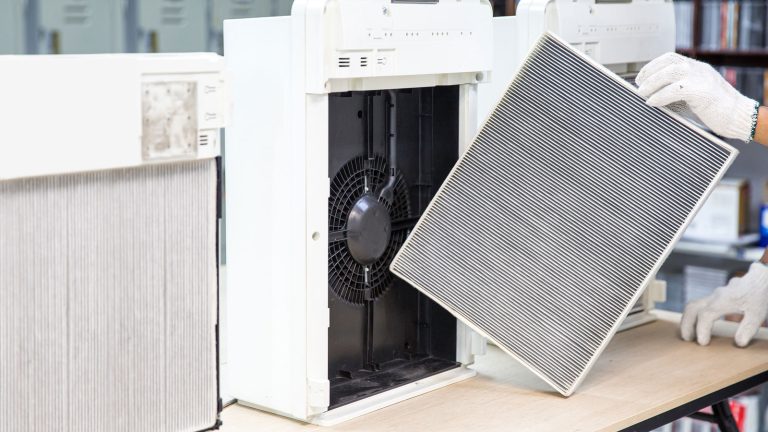 Replacing air filter of an air purifier, Can You Clean IQAir Filters? - 1600x900